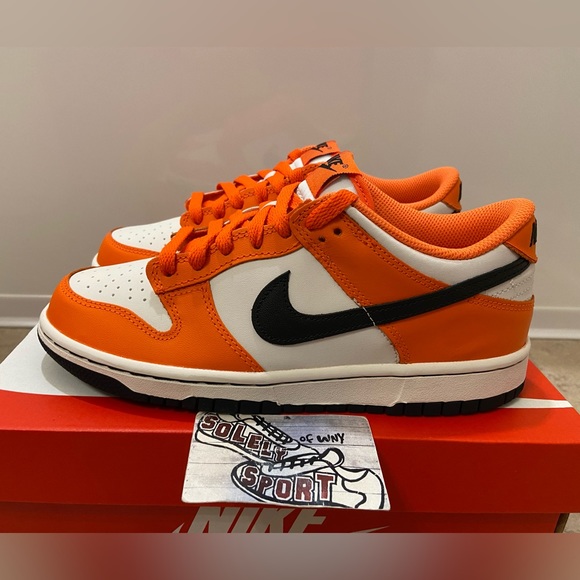orange nike shoes youth